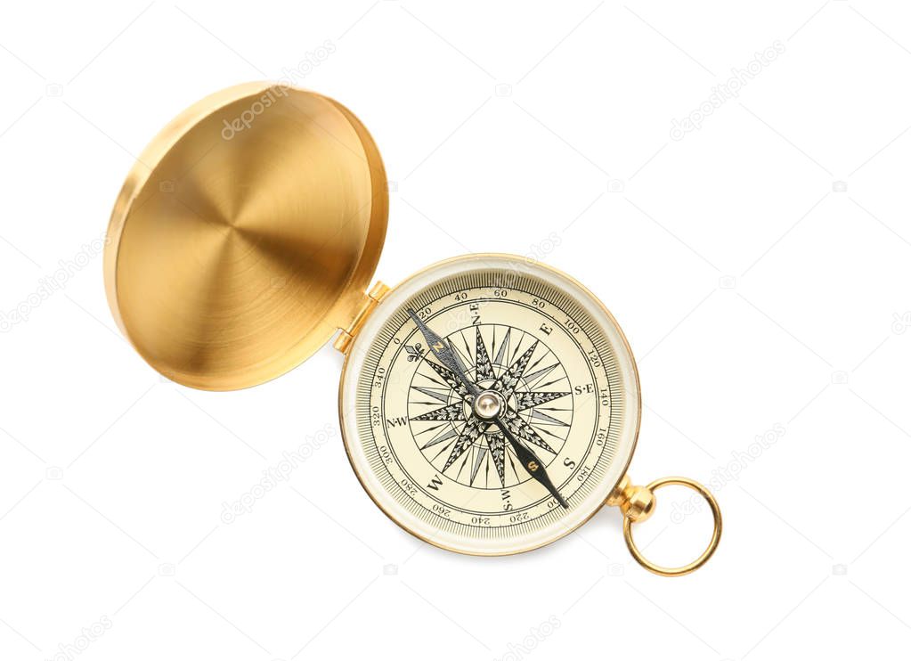 Golden compass on white background