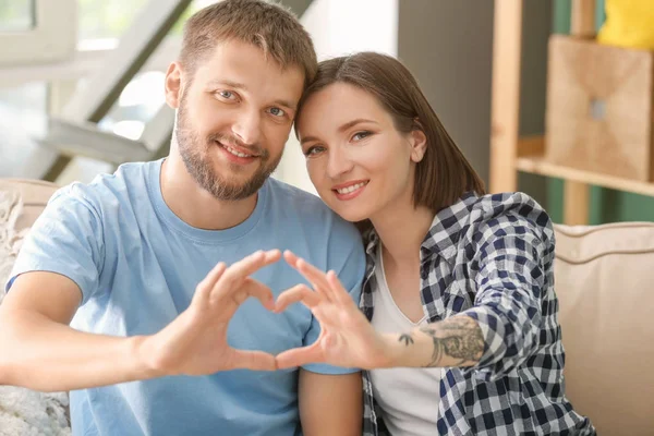 Happy Lovely Couple Making Heart Hands Home — Stock Photo, Image
