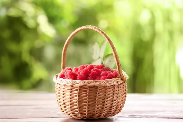 Wicker Basket Ripe Raspberry Wooden Table Blurred Background — Stock Photo, Image