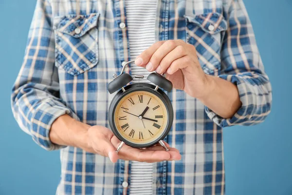 Man Holding Alarm Clock Color Background Closeup Time Management Concept — Stock Photo, Image