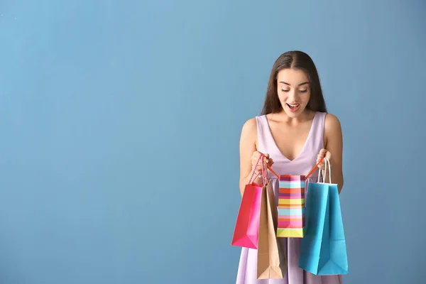 Emotional Young Woman Shopping Bags Color Background — Stock Photo, Image