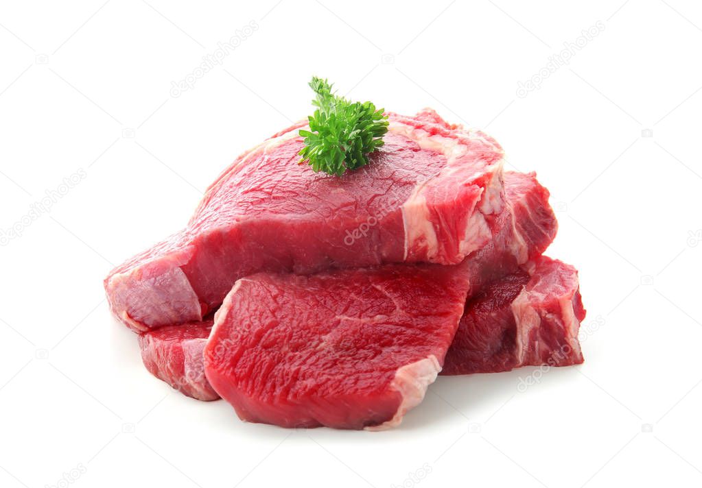 Fresh raw meat with parsley on white background