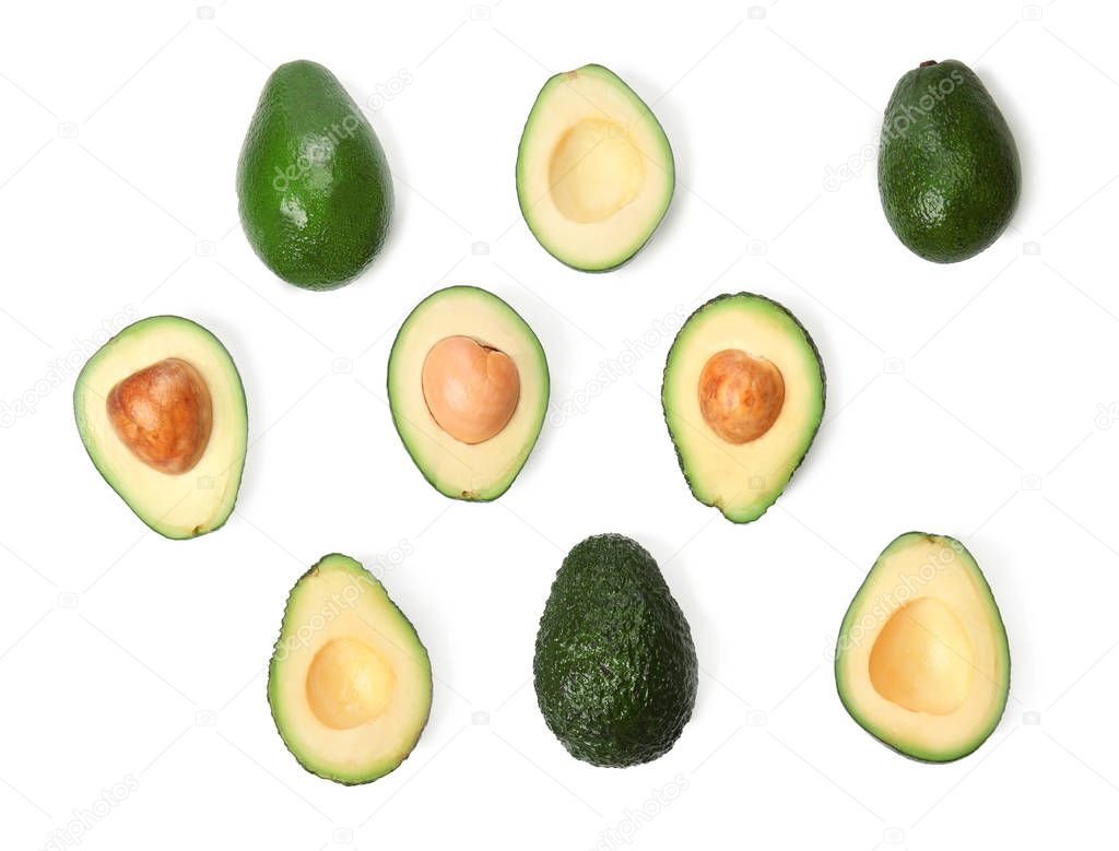 Fresh ripe avocados on white background, flat lay