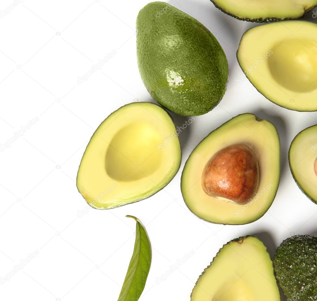 Fresh ripe avocados on white background, top view