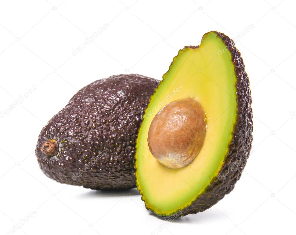 Ripe fresh avocados on white background