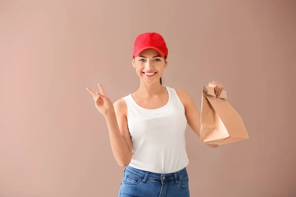 Young Woman Paper Bag Showing Victory Sign Color Background Food — Stock Photo, Image