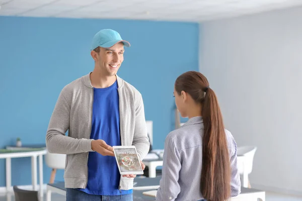 Young Worker Food Delivery Service Tablet Computer Customer Indoors — Stock Photo, Image