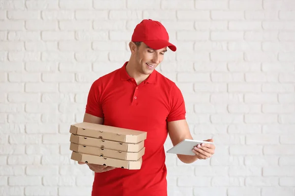 Young Man Pizza Boxes Tablet Computer White Brick Wall Food — Stock Photo, Image