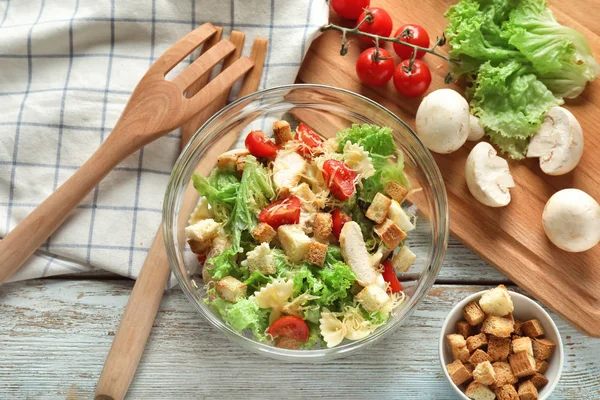 Tasty Caesar Salad Pasta Bowl Wooden Table — Stock Photo, Image