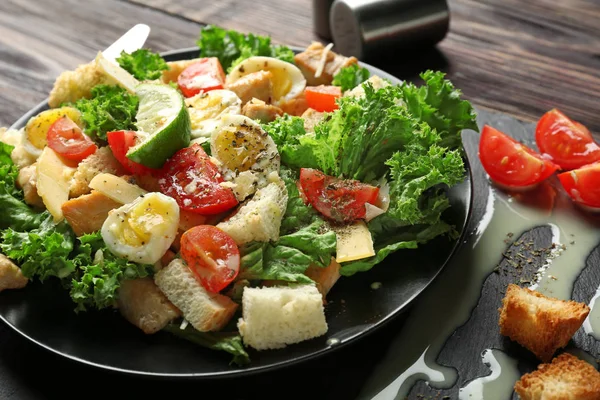 Plate Tasty Caesar Salad Wooden Table Closeup — Stock Photo, Image