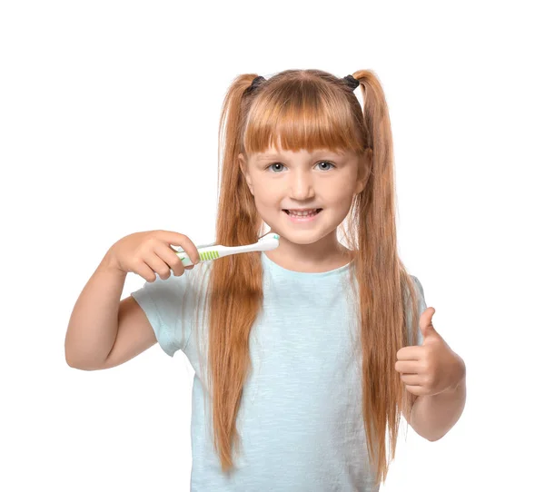 Мила Дівчинка Зубною Щіткою Показує Жест Великого Пальця Білому Тлі — стокове фото