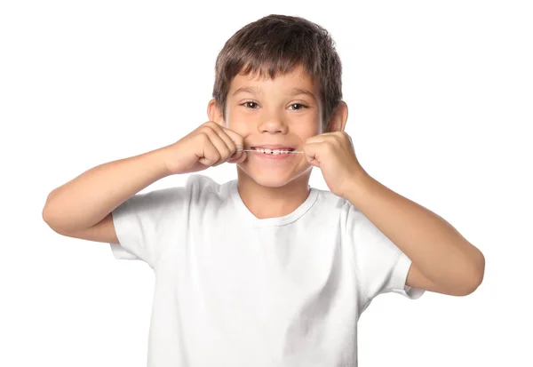 Lindo Niño Pequeño Usando Hilo Dental Sobre Fondo Blanco —  Fotos de Stock