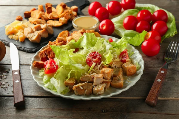 Plate Tasty Caesar Salad Wooden Table — Stock Photo, Image