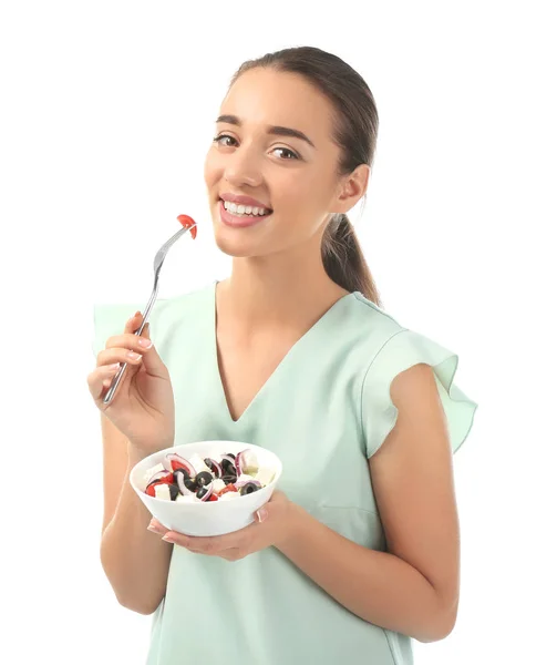 Jovem Mulher Comendo Salada Fresca Fundo Branco — Fotografia de Stock