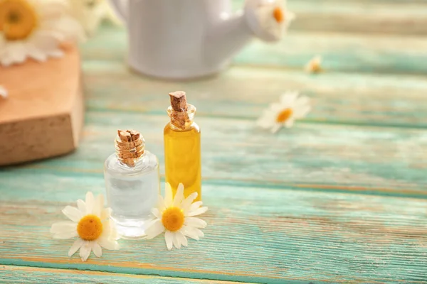 Bottles Essential Oil Chamomile Flowers Wooden Table — Stock Photo, Image