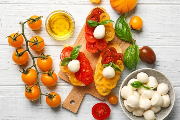 Fresh Cherry Tomatoes Mozzarella Cheese Tasty Sandwiches Wooden Table Top — Stock Photo, Image