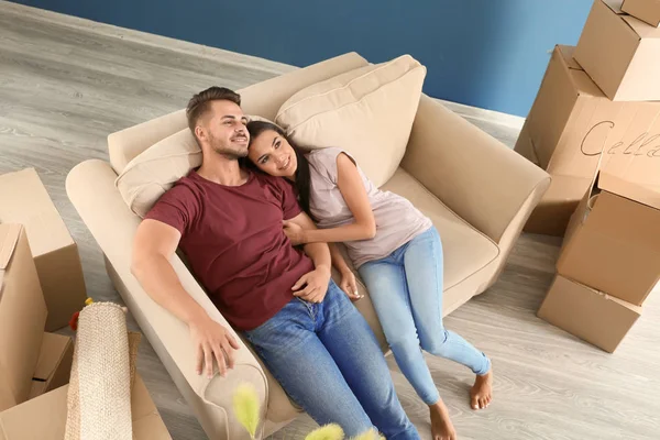 Young Happy Couple Resting Sofa New Home — Stock Photo, Image