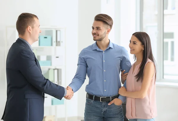Young Man Shaking Hands Estate Agent Office — Stock Photo, Image