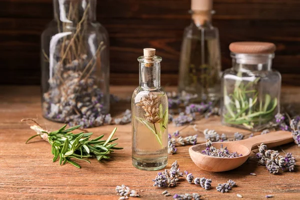 Bottle Essential Oil Lavender Rosemary Wooden Table — Stock Photo, Image