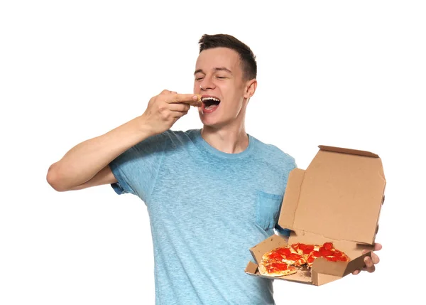 Joven Comiendo Deliciosa Pizza Sobre Fondo Blanco —  Fotos de Stock