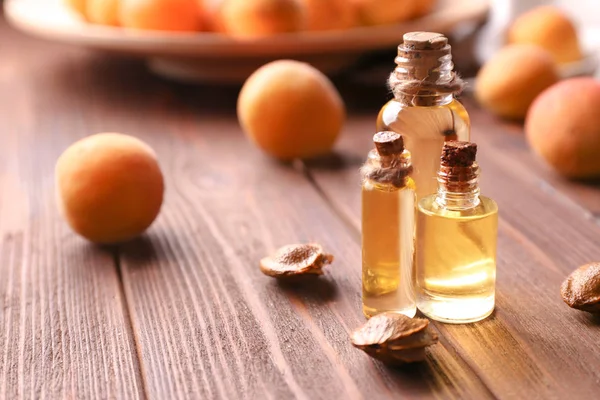Bottles Apricot Essential Oil Wooden Table — Stock Photo, Image