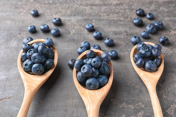 Spoons Ripe Blueberries Grey Table — Stock Photo, Image