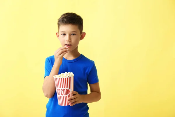 Cute Little Boy Eating Popcorn Color Background — Stock Photo, Image