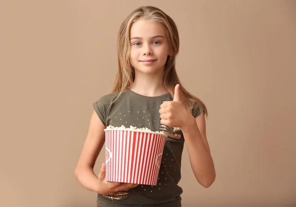 Cute Little Girl Cup Popcorn Showing Thumb Color Background — Stock Photo, Image