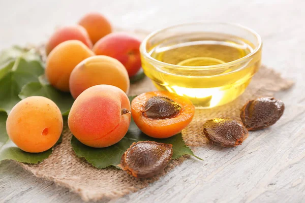 Bowl Essential Oil Fresh Apricots Table — Stock Photo, Image