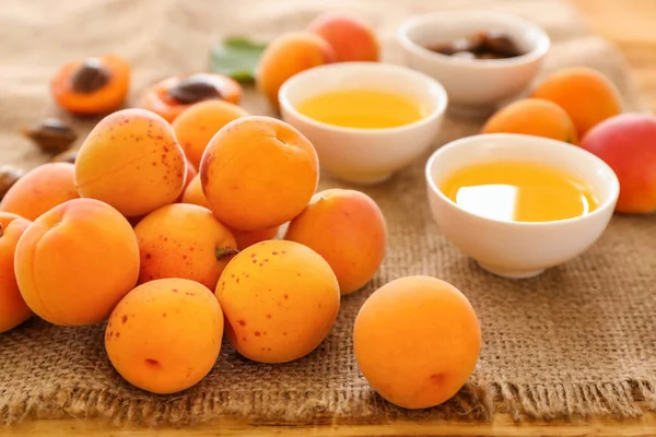 Bowls Essential Oil Fresh Apricots Table — Stock Photo, Image