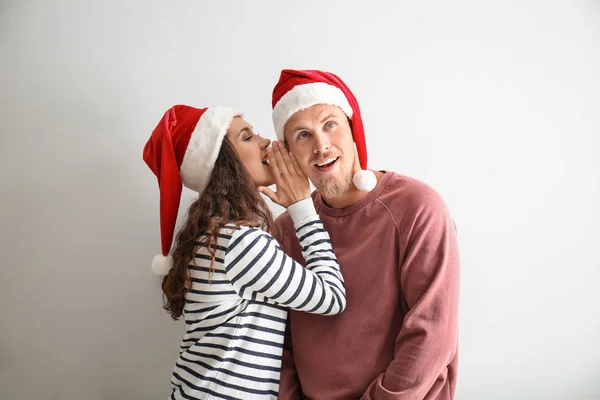 Portrait Cute Young Woman Santa Hat Telling Secret Her Boyfriend — Stock Photo, Image