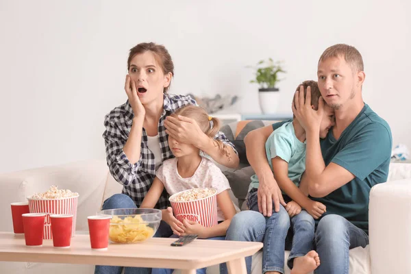 Family Eating Popcorn While Watching Scary Movie Home — Stock Photo, Image