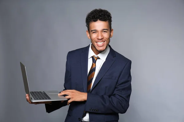 Handsome African American Businessman Laptop Grey Background — Stock Photo, Image