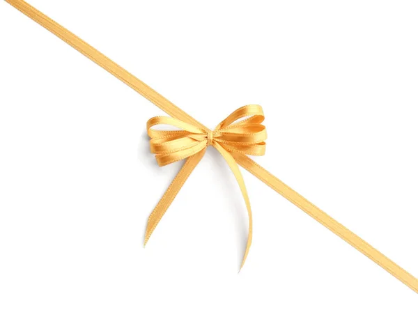 白色背景上有蝴蝶结的金色带子 — 图库照片