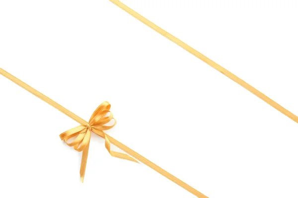 白色背景带弓的金色缎带 — 图库照片