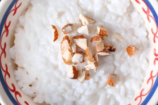 Bowl Delicious Rice Pudding Nuts Closeup — Stock Photo, Image