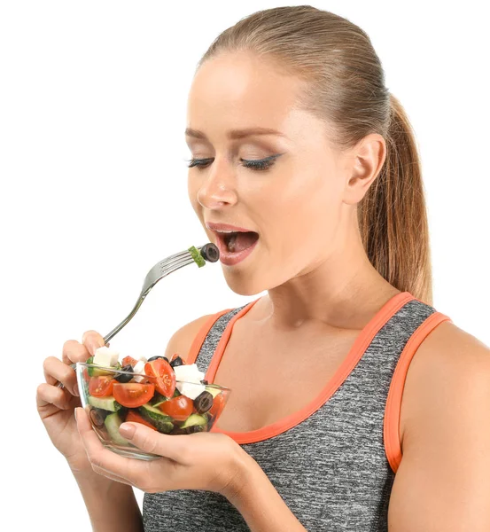 Mujer Deportiva Comiendo Ensalada Verduras Frescas Sobre Fondo Blanco — Foto de Stock