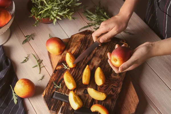 Woman Cutting Fresh Sweet Peaches Wooden Table — Stock Photo, Image