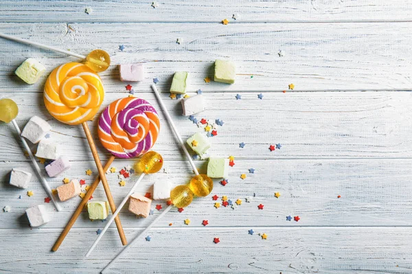 Delicious Lollipops Sweets White Wooden Background — Stock Photo, Image