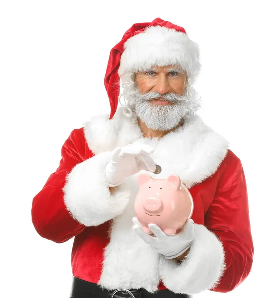 Санта Клаус Кладет Монету Копилку Белом Фоне — стоковое фото