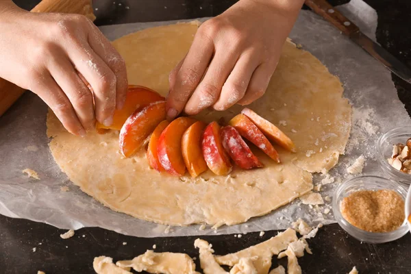 Woman Preparing Peach Galette Table — Stock Photo, Image