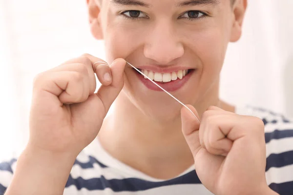 Young Man Flossing Teeth Closeup — Stock Photo, Image