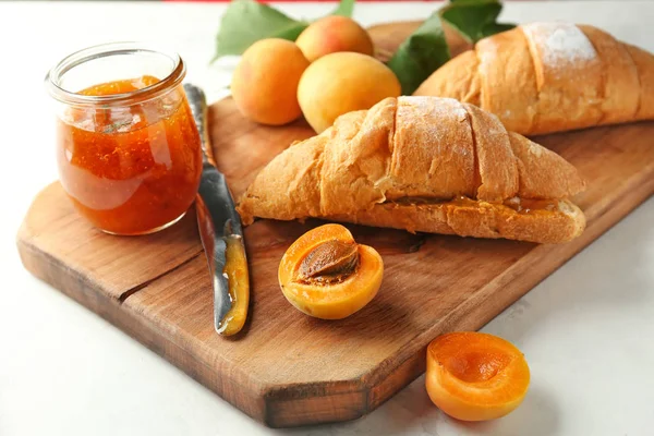 Jar Delicious Apricot Jam Croissants Wooden Board — Stock Photo, Image