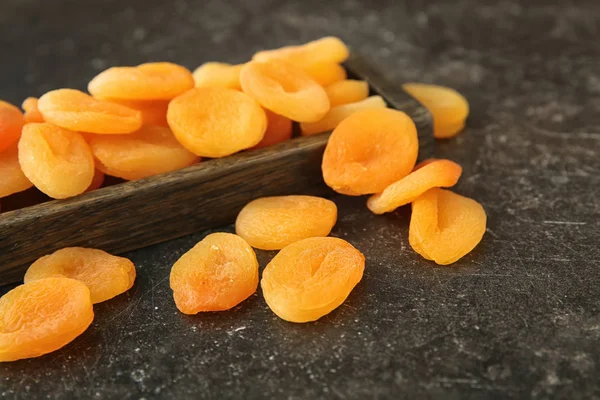 Wooden Tray Dried Apricots Dark Table — Stock Photo, Image