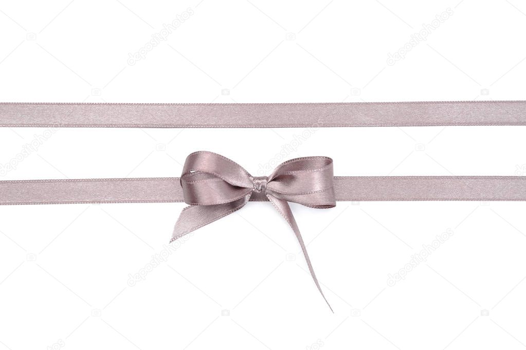 Silver ribbons with bow on white background
