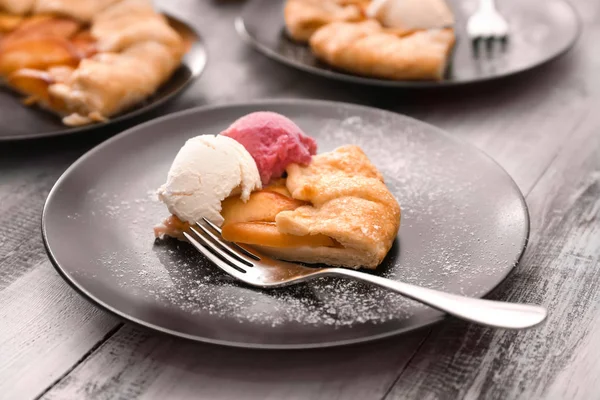 Plate Piece Delicious Peach Galette Ice Cream Wooden Table — Stock Photo, Image