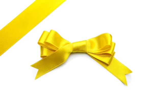 白い背景に弓を持つ黄色のリボン — ストック写真