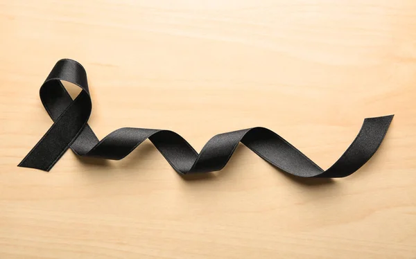 Black Ribbon Wooden Background Melanoma Concept — Stock Photo, Image