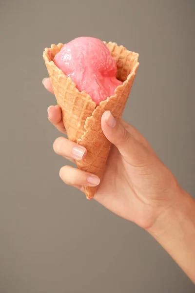 Woman Holding Waffle Cone Delicious Strawberry Ice Cream Grey Background — Stock Photo, Image