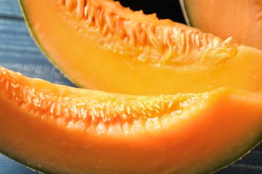 Tablo, closeup kesme olgunlaşmış kavun parçaları